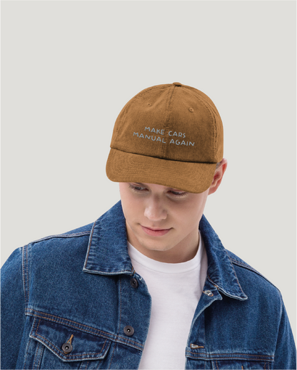 "Make cars manual again" cap